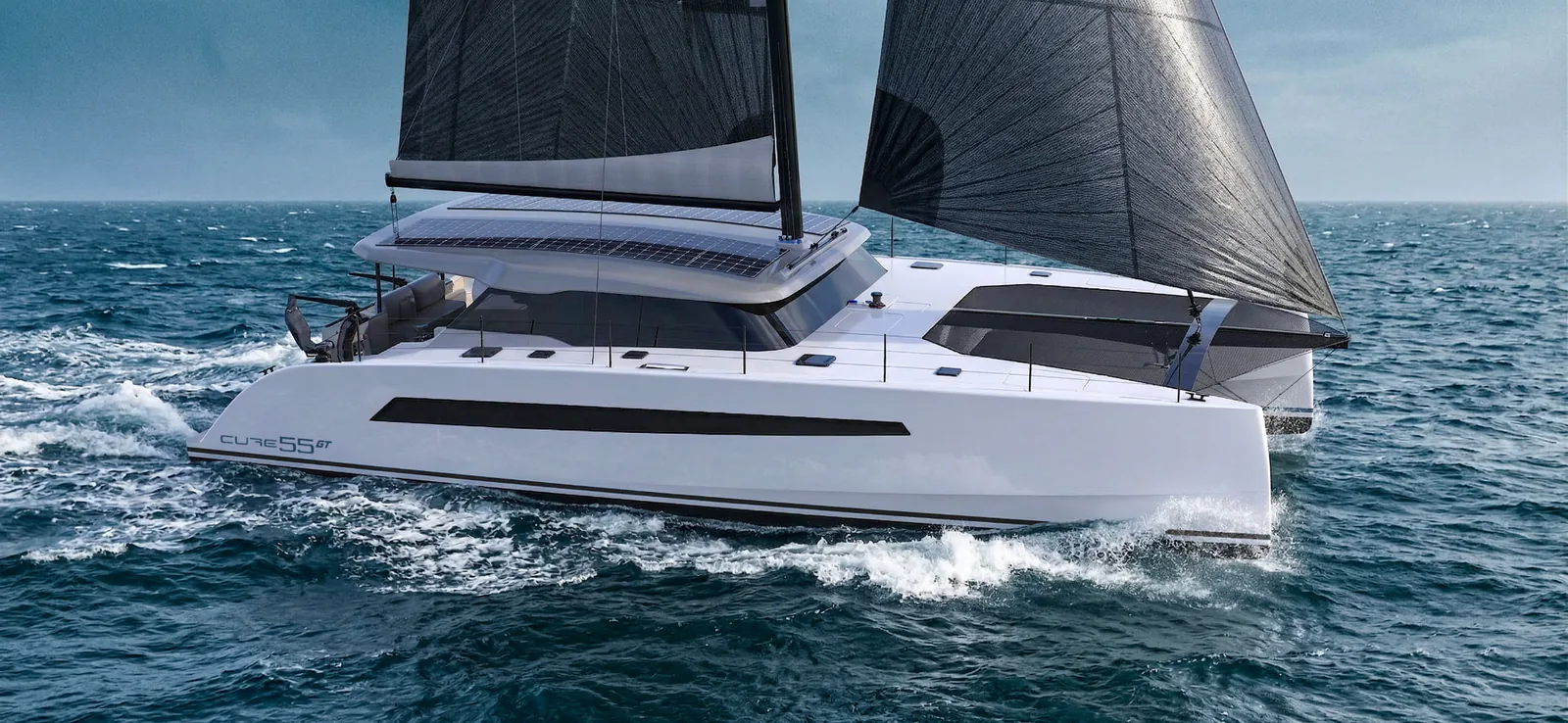 Helming a Cure catamaran